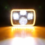 Комплект от 2бр. универсален 60W ЛЕД LED фар лампа халоген 12V-24V къси/дълги с DRL дневни светлини мигач бяло-жълто 20 x 14cm за АТВ джип мотоциклет камион трактор и др